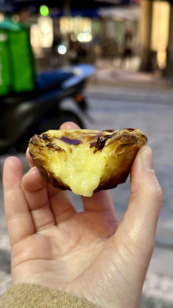 The inside of a pastel de nata from Manteigaria in Porto