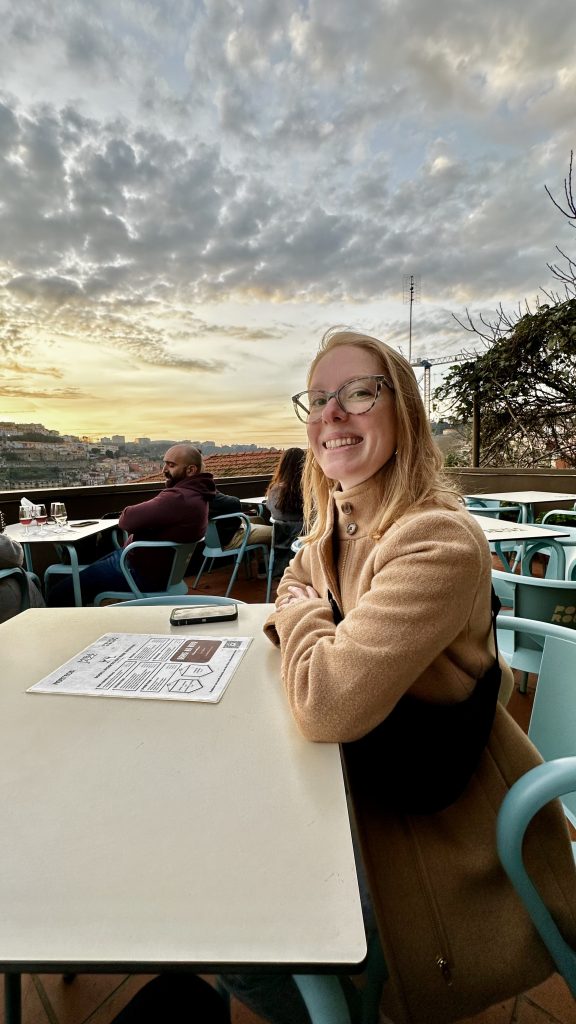 Aimee at a table at Mirajazz in Porto