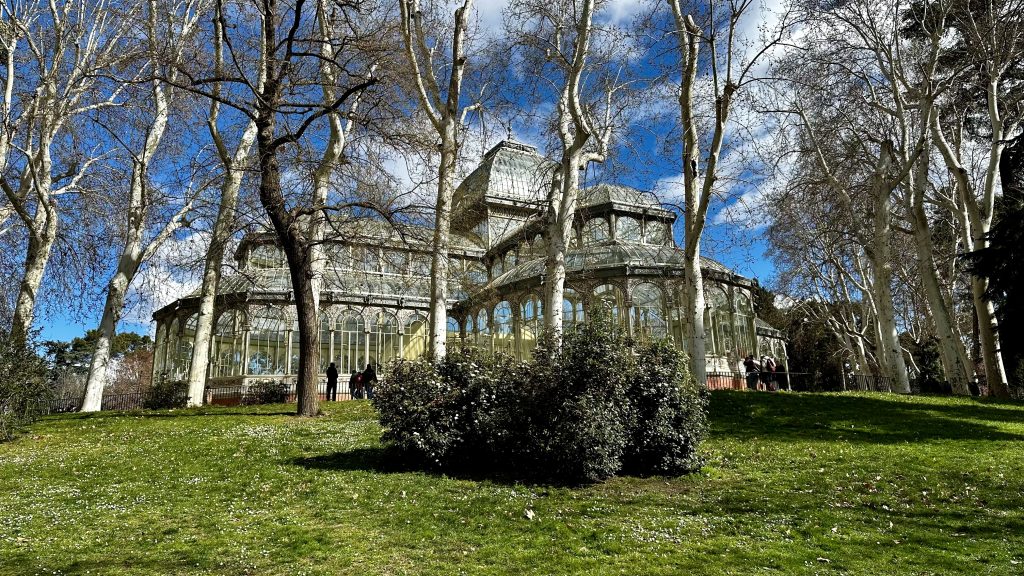 Palacio de Cristal in Madrid's Parque Retiro on a sunny day