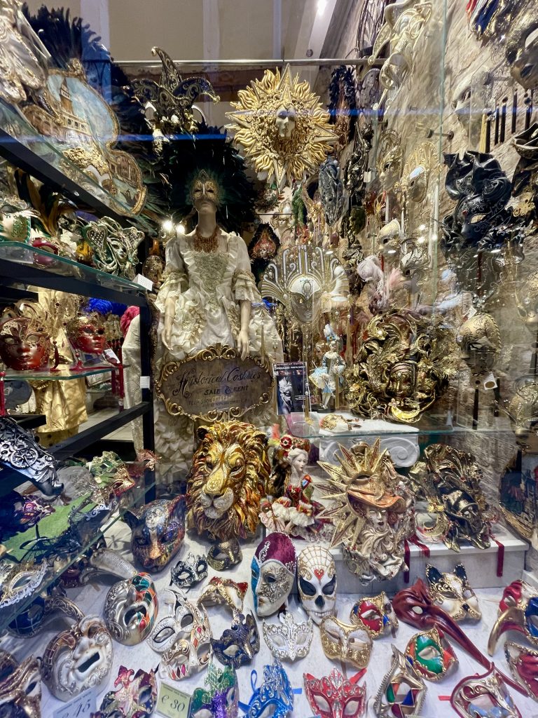 Carnevale masks in a shop window in Venice